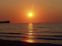 Sonnenuntergang am Almiros Beach